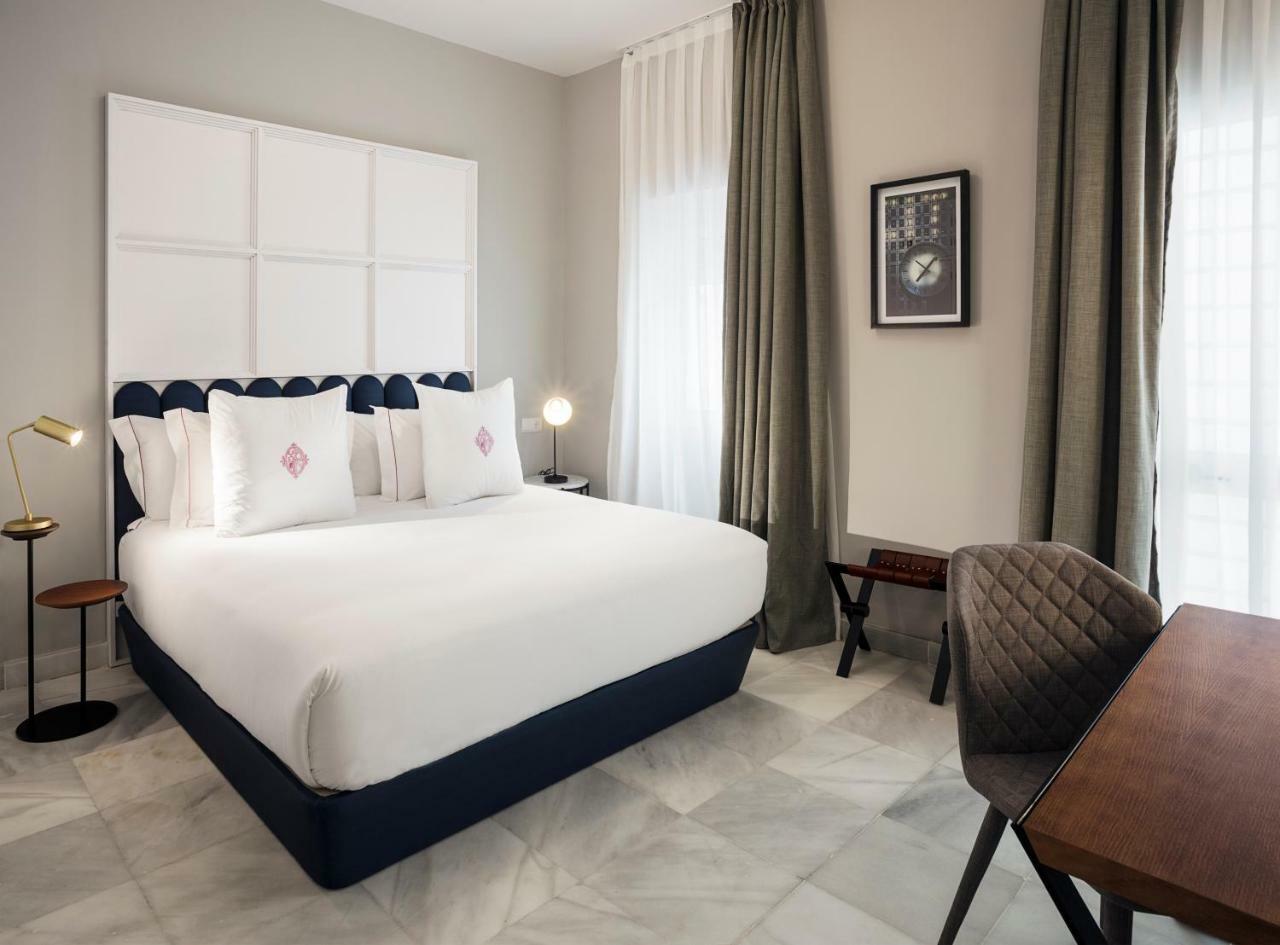 Apartamentos One Shot Conde De Torrejon เซบีญา ภายนอก รูปภาพ